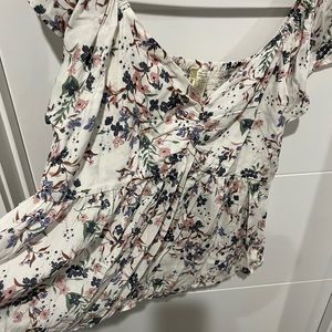 White cropped peplum with pink and blue floral pattern